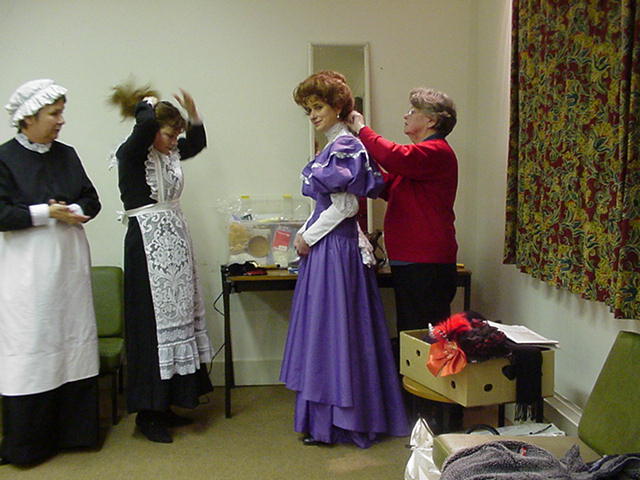 Elizabeth, Nancy and Bella getting dressed